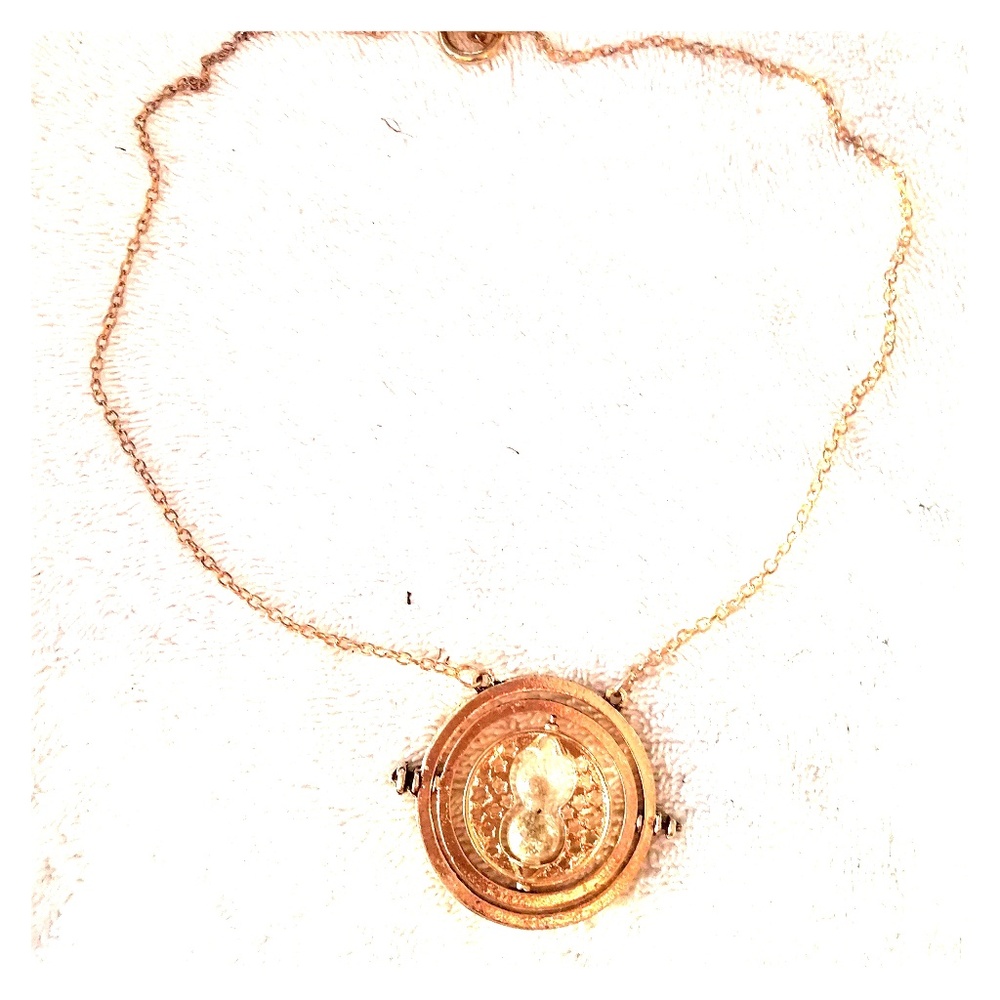 Gold tone hour glass necklace